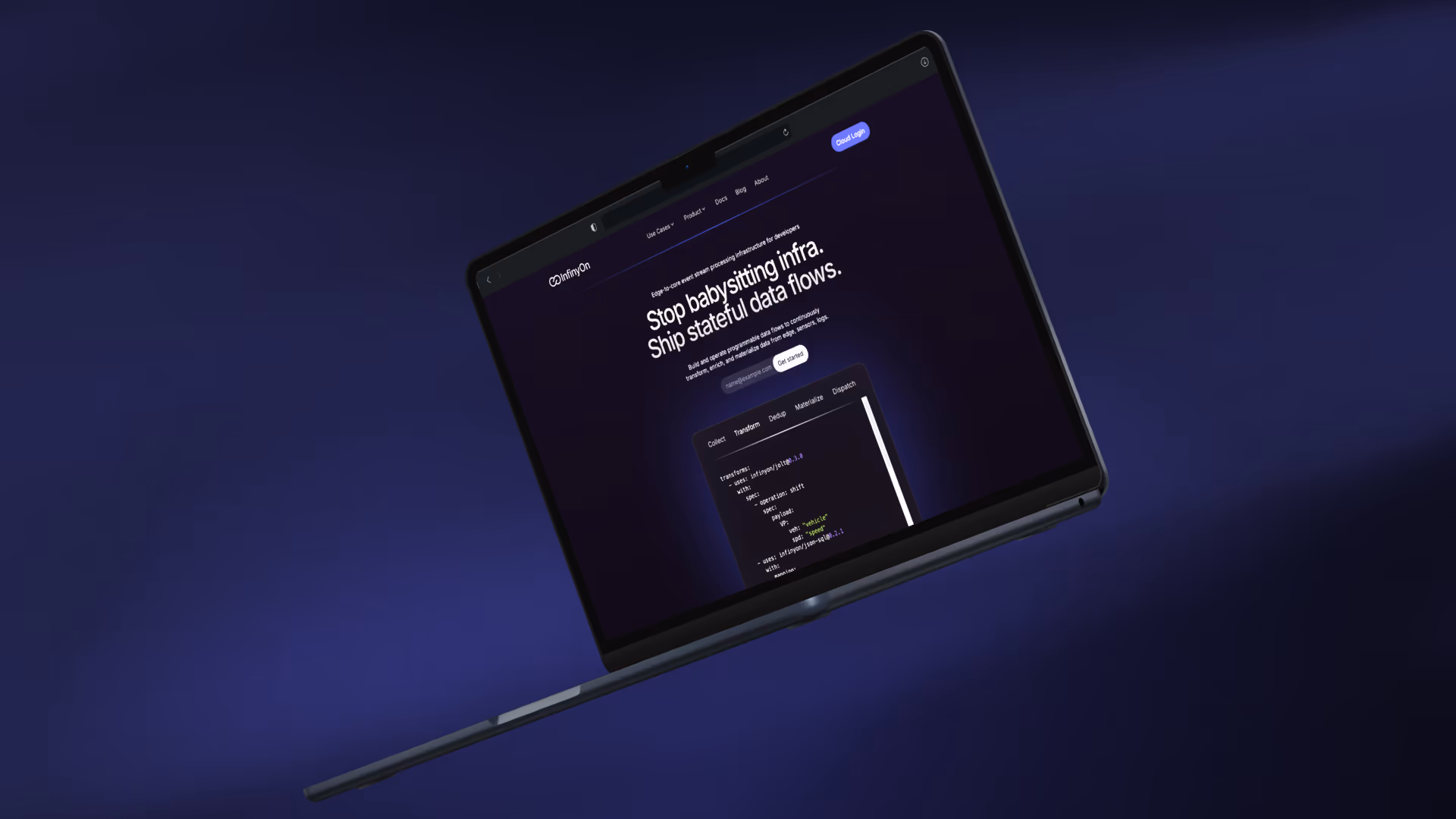 InfinyOn website displayed on a laptop in a modern workspace